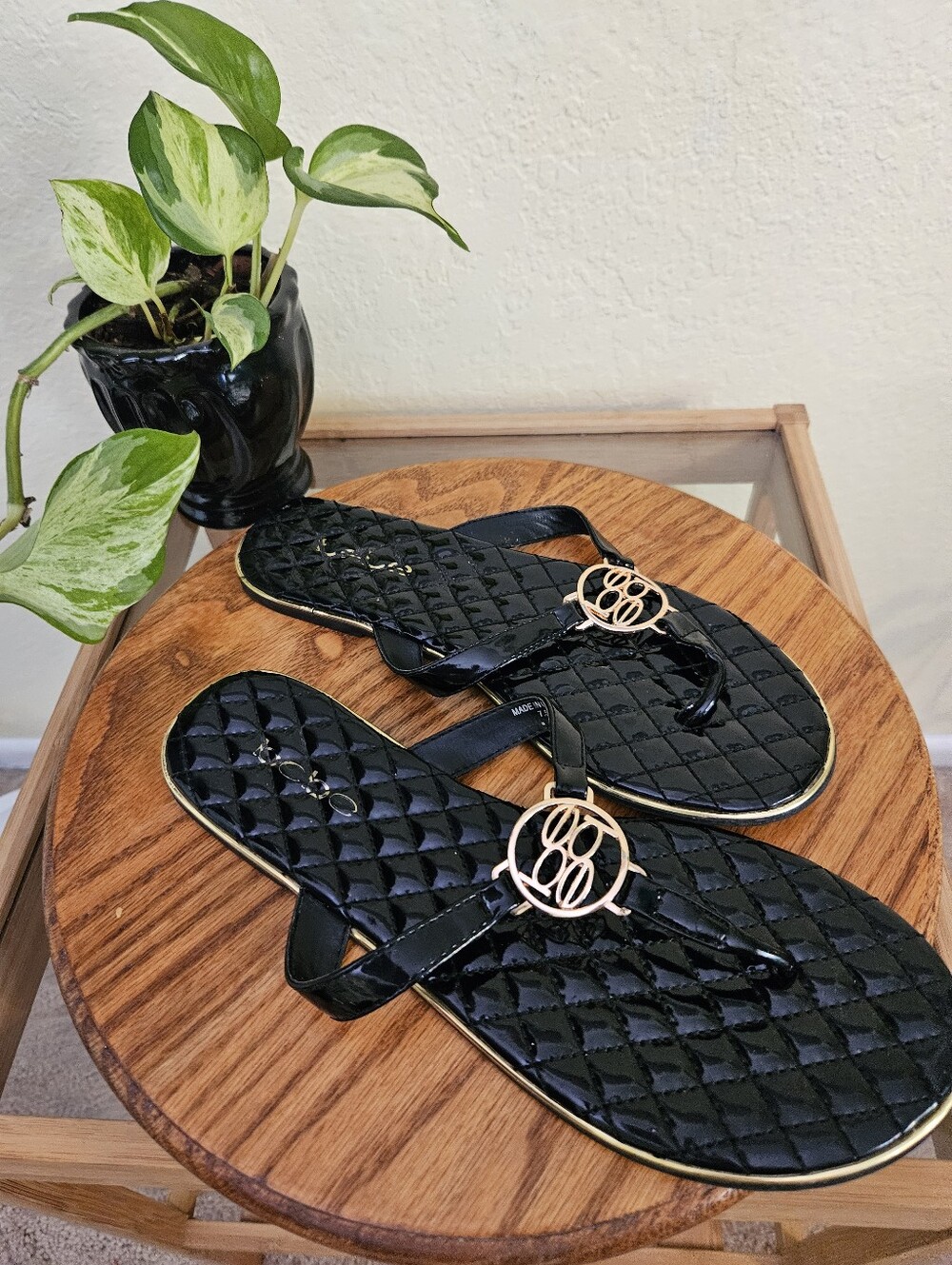 Bebe Black Quilted Patent Thong Sandals with Gold Logo Accent